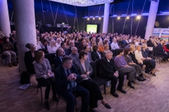 Kilkadziesiąt osób siedzących na publiczności w sali konferencyjnej w Lubelskim Centrum Konferencyjnym